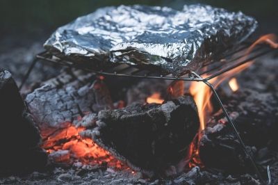 cooking on the embers of a campfire